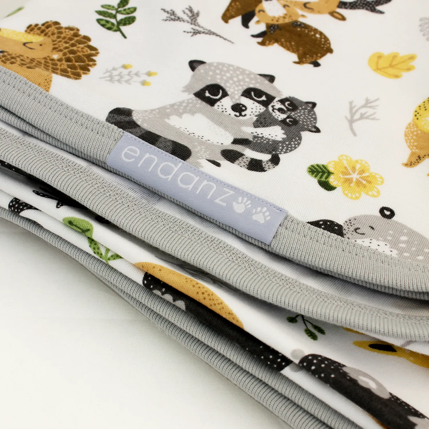 Wrapped with Endanzoo Organic Baby Swaddle Blanket - Safari Hugs